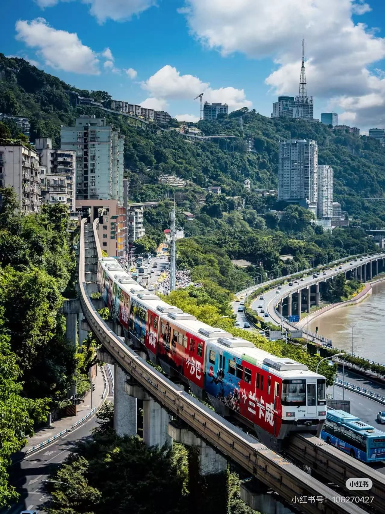 Hongyadong stilted buildings lit up at night above the Jialing River, Chongqing